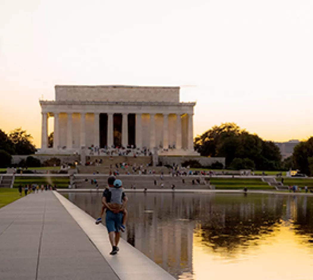 Family walking at Lincoln Memorial